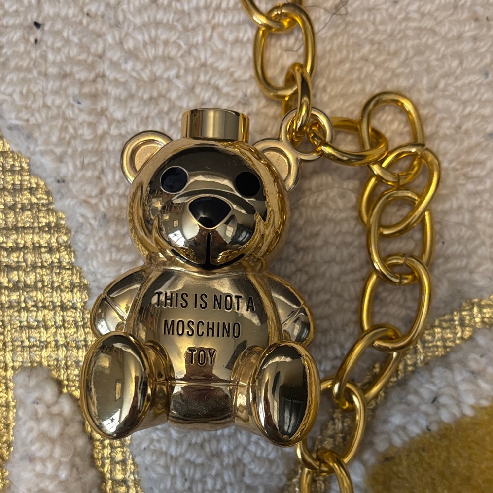 Moschino x Sephora Gold Teddy Bear Necklace lip gloss holder. Limited edition.